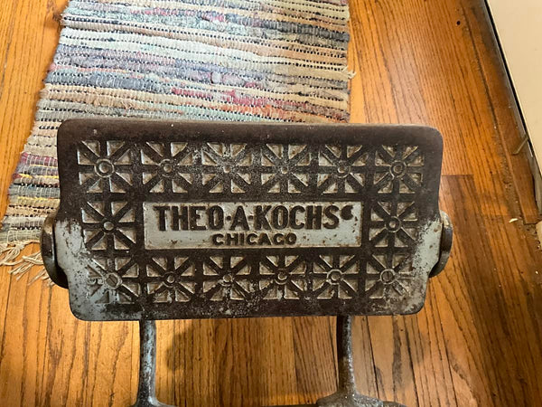 ANTIQUE THEO-A-KOCHS CAST IRON BARBER'S CHAIR (100+ YEARS OLD)